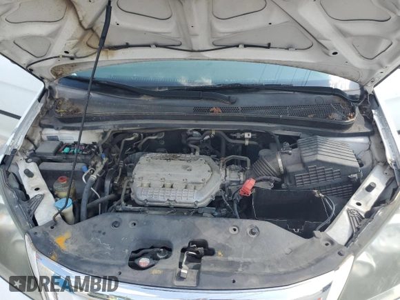 2009 Honda Odyssey LX with VIN 5FNRL38259B040742, listed as a Copart auction lot 59397975 with 161,562 mi miles and Clean title. Bid and sale history available at DreamBid. Image 12.