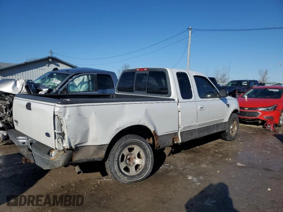 2002 Ford F-150 XL with VIN 1FTRX17L52NA26169, listed as a Copart auction lot 88756715 with 114,841 mi miles and Salvage title. Bid and sale history available at DreamBid. Image 3.