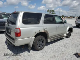 2000 Toyota 4Runner SR5 z VIN JT3HN86R3Y0277802, wystawiony jako Copart lot #60646825 z przebiegiem 215 251 mil mil oraz Czysty tytuł • Clean title. Historia ofert i sprzedaży dostępna na DreamBid. Obrazek 3.