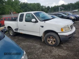 2000 Ford F-150 with VIN 2FTRX08W3YCA36619, listed as a Copart auction lot 62683885 with Not provided miles and Salvage title. Bid and sale history available at DreamBid. Image 4.