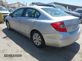 2012 Honda Civic LX z VIN 19XFB2F50CE332101, wystawiony jako IAAI lot #42359452 z przebiegiem 132 170 mil mil oraz . Historia ofert i sprzedaży dostępna na DreamBid. Obrazek 3.