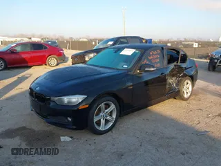 2015 BMW 3 Series 320i with VIN WBA3B1C53FP831476, listed as a IAAI auction lot 41219821 with 108,852 mi miles. Bid and sale history available at carsss.com. Image 2.