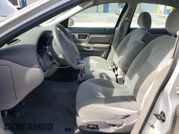 2003 Ford Taurus SE with VIN 1FAHP53233G244946, listed as a Copart auction lot 61238665 with 62,315 mi miles and Clean title. Bid and sale history available at DreamBid. Image 7.