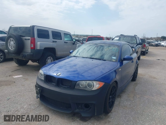 2008 BMW 1 Series 135i with VIN WBAUC73598VF23878, listed as a IAAI auction lot 41569879 with 186,622 mi miles. Bid and sale history available at carsss.com. Image 2.