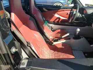 2006 Lotus Elise z VIN SCCPC11196HL30330, wystawiony jako Copart lot #77806924 z przebiegiem Nie podano mil oraz Szkody całkowita. Historia ofert i sprzedaży dostępna na DreamBid. Obrazek 10.