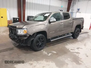 2016 GMC Canyon 4WD SLT z VIN 1GTP6DE13G1229783, wystawiony jako IAAI lot #41583360 z przebiegiem 80 149 mil mil oraz . Historia ofert i sprzedaży dostępna na DreamBid. Obrazek 2.