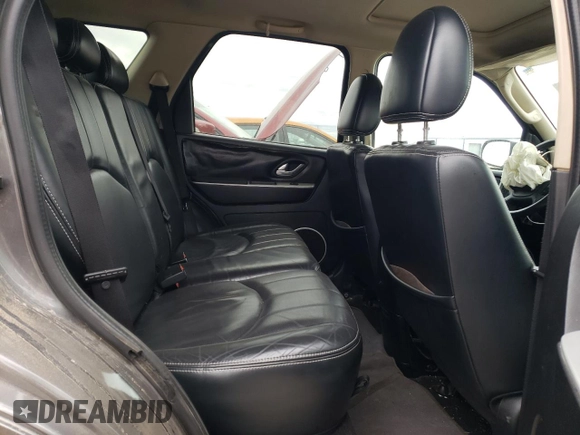 2005 Mercury Mariner Luxury z VIN 4M2YU57185DJ27043, wystawiony jako Copart lot #52980555 z przebiegiem 152 406 mil mil oraz Szkoda całkowita • Salvage title. Historia ofert i sprzedaży dostępna na DreamBid. Obrazek 10.