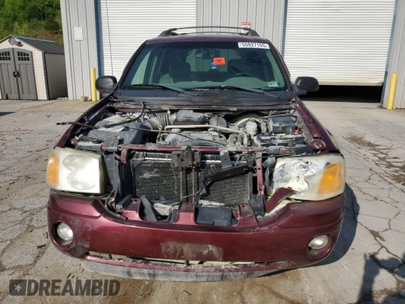 2003 GMC Envoy SLT z VIN 1GKET16S136186780, wystawiony jako Copart lot #55927155 z przebiegiem 163 099 mil mil oraz Szkoda całkowita • Salvage title. Historia ofert i sprzedaży dostępna na DreamBid. Obrazek 5.