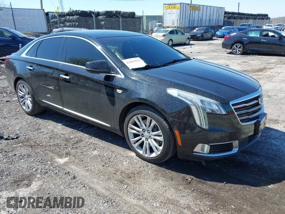 2018 Cadillac XTS Luxury with VIN 2G61M5S39J9161938, listed as a IAAI auction lot 42005882 with 102,335 mi miles. Bid and sale history available at carsss.com. Image 1.