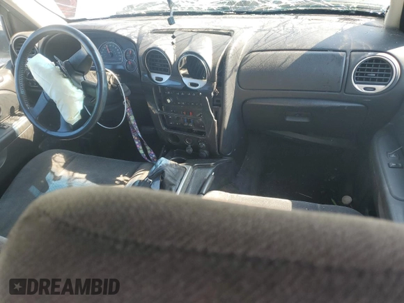 2009 GMC Envoy SLE z VIN 1GKDS33S292130250, wystawiony jako Copart lot #53634415 z przebiegiem Nie podano mil oraz Szkoda całkowita • Salvage title. Historia ofert i sprzedaży dostępna na DreamBid. Obrazek 8.