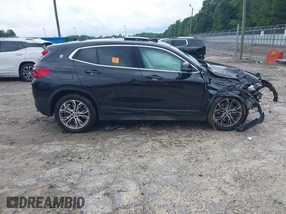 2018 BMW X2 sDrive28i z VIN WBXYJ3C31JEJ84394, wystawiony jako IAAI lot #42364160 z przebiegiem Nie podano mil oraz . Historia ofert i sprzedaży dostępna na DreamBid. Obrazek 13.