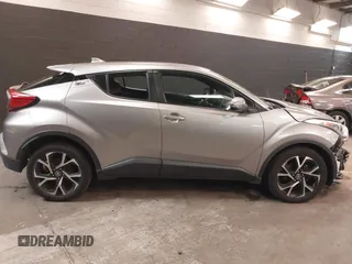 2018 Toyota C-HR XLE z VIN NMTKHMBX5JR039263, wystawiony jako IAAI lot #42265976 z przebiegiem 88 253 mil mil oraz . Historia ofert i sprzedaży dostępna na DreamBid. Obrazek 14.