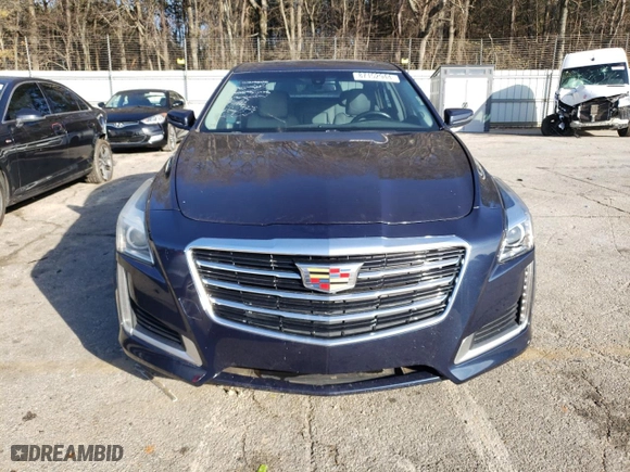 2015 Cadillac CTS Sedan RWD with VIN 1G6AP5SX4F0129071, listed as a Copart auction lot 87152944 with 126,724 mi miles and Salvage Title. Bid and sale history available at carsss.com. Image 5.