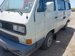 1991 Volkswagen Vanagon GL with VIN WV2ZB0258MG006802, listed as a IAAI auction lot 41969597 with 241,953 mi miles and . Bid and sale history available at DreamBid. Image 6.