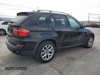 2012 BMW X5 35i z VIN 5UXZV4C51CL989449, wystawiony jako Copart lot #56762095 z przebiegiem 112 576 mil mil oraz Szkoda całkowita • Salvage title. Historia ofert i sprzedaży dostępna na DreamBid. Obrazek 3.