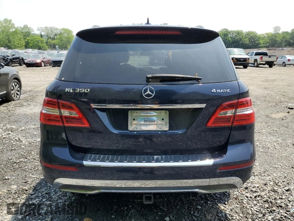 2015 Mercedes-Benz M 350 with VIN 4JGDA5HB2FA529997, listed as a Copart auction lot 59504795 with 69,872 mi miles and Salvage title. Bid and sale history available at DreamBid. Image 6.