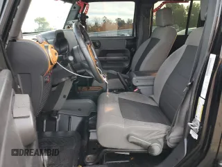 2008 Jeep Wrangler Unlimited X with VIN 1J4GB39168L649280, listed as a Copart auction lot 81379354 with 161,365 mi miles and Salvage Title. Bid and sale history available at DreamBid. Image 7.