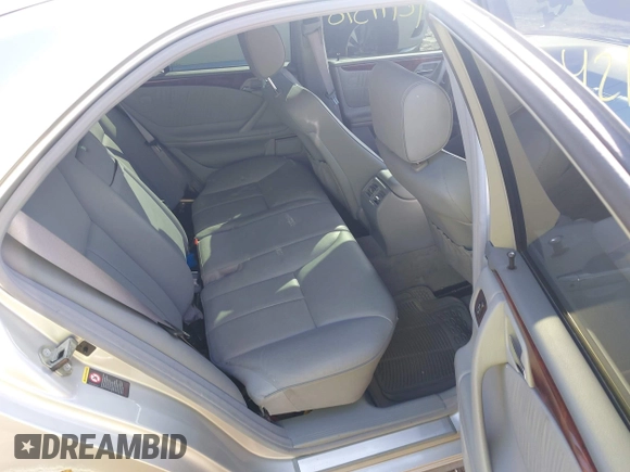 2001 Mercedes-Benz E-Class with VIN WDBJF65J61B373135, listed as a IAAI auction lot 42149598 with 123,314 mi miles. Bid and sale history available at carsss.com. Image 8.
