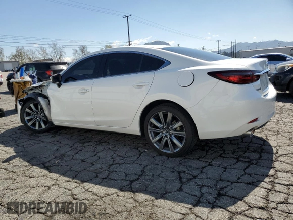 2021 Mazda 6 Touring with VIN JM1GL1VM0M1612027, listed as a Copart auction lot 48262185 with 67,568 mi miles and Salvage Title. Bid and sale history available at DreamBid. Image 2.