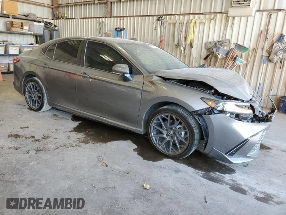 2025 Toyota Camry LE with VIN 4T1DAACKXSU556793, listed as a Copart auction lot 50574875 with 5,908 mi miles and Salvage Title. Bid and sale history available at carsss.com. Image 4.