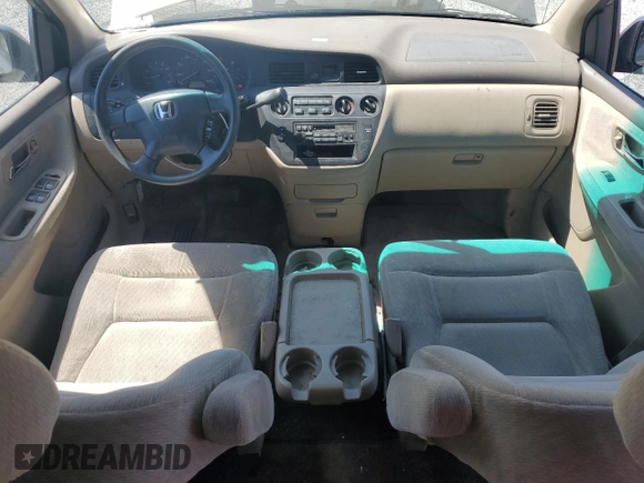2004 Honda Odyssey LX with VIN 5FNRL18574B102634, listed as a Copart auction lot 54669075 with 141,057 mi miles and Salvage title. Bid and sale history available at DreamBid. Image 8.