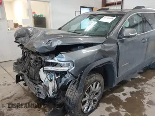 2021 GMC Acadia SLT z VIN 1GKKNMLS5MZ230427, wystawiony jako IAAI lot #41345085 z przebiegiem 59 084 mil mil oraz . Historia ofert i sprzedaży dostępna na DreamBid. Obrazek 6.