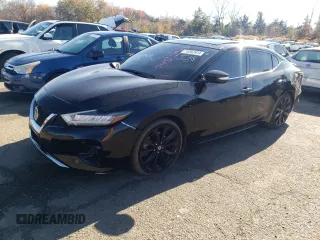 2019 Nissan Maxima Platinum z VIN 1N4AA6AV9KC374886, wystawiony jako Copart lot #74562913 z przebiegiem 49 599 mil mil oraz Szkody całkowita. Historia ofert i sprzedaży dostępna na DreamBid. Obrazek 1.