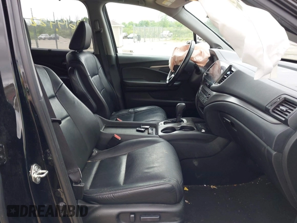 2020 Honda Pilot EX-L with VIN 5FNYF6H57LB059332, listed as a IAAI auction lot 42614422 with 110,279 mi miles and . Bid and sale history available at DreamBid. Image 5.