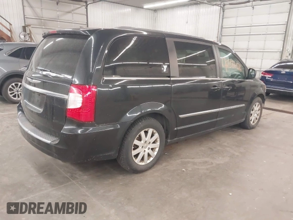 2013 Chrysler Town & Country Touring z VIN 2C4RC1BG0DR742005, wystawiony jako IAAI lot #42386516 z przebiegiem 200 982 mil mil oraz . Historia ofert i sprzedaży dostępna na DreamBid. Obrazek 4.