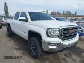 2018 GMC Sierra 1500 SLE z VIN 3GTU2MEC8JG590323, wystawiony jako IAAI lot #41613699 z przebiegiem 45 951 mil mil oraz . Historia ofert i sprzedaży dostępna na DreamBid. Obrazek 1.