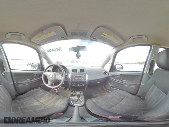 2012 Suzuki SX4 LE with VIN JS2YC5A34C6300079, listed as a Copart auction lot 68414434 with 111,661 mi miles and Salvage Title. Bid and sale history available at carsss.com. Image 12.