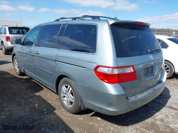 2005 Honda Odyssey EX-L with VIN 5FNRL38765B094377, listed as a IAAI auction lot 41933616 with 213,979 mi miles. Bid and sale history available at carsss.com. Image 3.