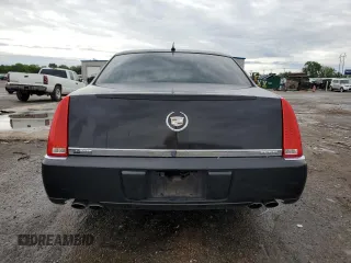 2007 Cadillac DTS V8 z VIN 1G6KD57Y27U179010, wystawiony jako Copart lot #54055605 z przebiegiem 137 326 mil mil oraz Szkoda całkowita • Salvage title. Historia ofert i sprzedaży dostępna na DreamBid. Obrazek 6.