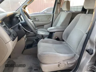 2002 Mazda Tribute LX with VIN 4F2YU09142KM22895, listed as a Copart auction lot 73797364 with 176,514 mi miles and Salvage Title. Bid and sale history available at carsss.com. Image 7.