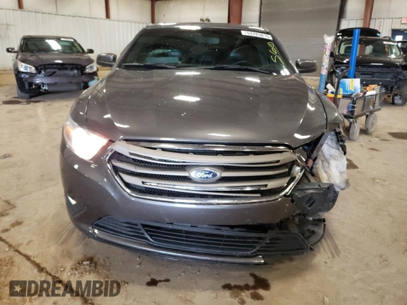 2013 Ford Taurus SEL z VIN 1FAHP2H83DG223446, wystawiony jako Copart lot #53783815 z przebiegiem 122 867 mil mil oraz Czysty tytuł • Clean title. Historia ofert i sprzedaży dostępna na DreamBid. Obrazek 5.