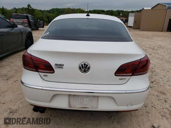 2013 Volkswagen CC R-Line z VIN WVWBN7AN6DE504252, wystawiony jako Copart lot #51750095 z przebiegiem 166 427 mil mil oraz Czysty tytuł • Clean title. Historia ofert i sprzedaży dostępna na DreamBid. Obrazek 6.