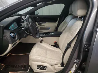 2019 Jaguar XJ Portfolio with VIN SAJWA2G71K8W19797, listed as a Copart auction lot 54133195 with 57,446 mi miles and Salvage Title. Bid and sale history available at DreamBid. Image 7.