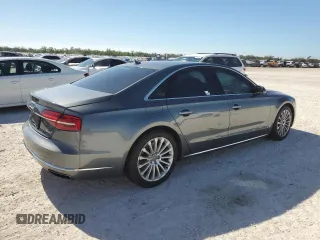 2015 Audi A8 with VIN WAUJGAFD5FN009026, listed as a Copart auction lot 81938904 with 122,880 mi miles and Salvage title. Bid and sale history available at DreamBid. Image 3.