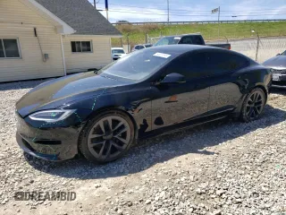2021 Tesla Model S Plaid z VIN 5YJSA1E63MF451391, wystawiony jako Copart lot #54821985 z przebiegiem 50 480 mil mil oraz Szkoda całkowita • Salvage title. Historia ofert i sprzedaży dostępna na DreamBid. Obrazek 1.