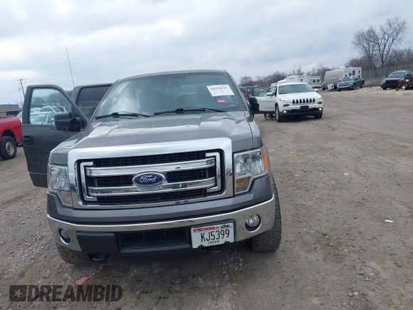 2014 Ford F-150 XL with VIN 1FTFW1EF7EFA31990, listed as a IAAI auction lot 41954531 with 158,521 mi miles. Bid and sale history available at carsss.com. Image 12.