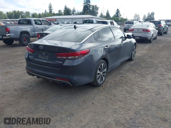2016 Kia Optima SX Turbo z VIN 5XXGW4L28GG010897, wystawiony jako IAAI lot #42703779 z przebiegiem 121 918 mil mil oraz . Historia ofert i sprzedaży dostępna na DreamBid. Obrazek 4.