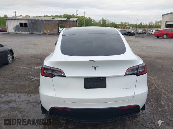 2024 Tesla Model Y Long Range with VIN 7SAYGAEE2RF014315, listed as a IAAI auction lot 42053183 with 36,521 mi miles and . Bid and sale history available at DreamBid. Image 16.