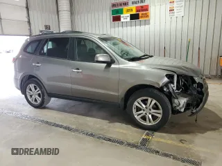2011 Hyundai Santa Fe Limited z VIN 5XYZKDAGXBG085463, wystawiony jako Copart lot #59964705 z przebiegiem 168 021 mil mil oraz Szkoda całkowita • Salvage title. Historia ofert i sprzedaży dostępna na DreamBid. Obrazek 4.