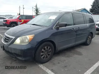 2008 Honda Odyssey EX with VIN 5FNRL38458B023343, listed as a IAAI auction lot 41468712 with 150,199 mi miles. Bid and sale history available at carsss.com. Image 2.