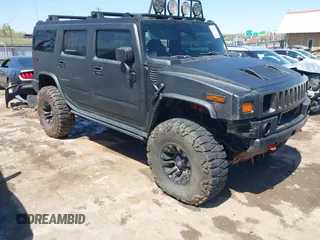 2005 Hummer H2 SUV z VIN 5GRGN23U75H124400, wystawiony jako IAAI lot #41967105 z przebiegiem 96 484 mil mil oraz . Historia ofert i sprzedaży dostępna na DreamBid. Obrazek 1.