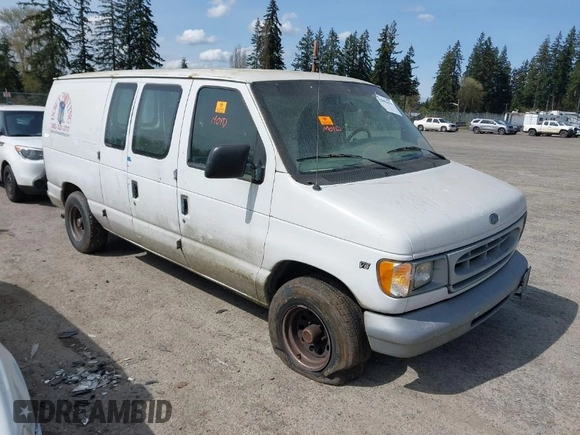 2000 Ford Econoline Cargo with VIN 1FTRE14W7YHA37668, listed as a IAAI auction lot 42001679 with 210,713 mi miles. Bid and sale history available at carsss.com. Image 1.