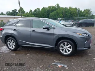 2016 Lexus RX 350 z VIN 2T2BZMCA5GC052214, wystawiony jako IAAI lot #42669843 z przebiegiem 93 891 mil mil oraz . Historia ofert i sprzedaży dostępna na DreamBid. Obrazek 13.
