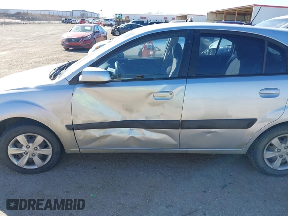 2009 Kia Rio LX with VIN KNADE243596530314, listed as a IAAI auction lot 41681050 with 114,831 mi miles. Bid and sale history available at carsss.com. Image 14.