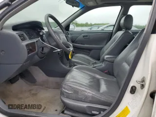 2000 Toyota Camry CE z VIN JT2BG28KXY0432024, wystawiony jako Copart lot #57057905 z przebiegiem 201 289 mil mil oraz Szkoda całkowita • Salvage title. Historia ofert i sprzedaży dostępna na DreamBid. Obrazek 7.