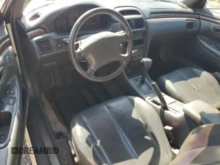 2000 Toyota Solara SE z VIN 2T1CF28P2YC378976, wystawiony jako Copart lot #61400195 z przebiegiem 197 090 mil mil oraz Czysty tytuł • Clean title. Historia ofert i sprzedaży dostępna na DreamBid. Obrazek 8.
